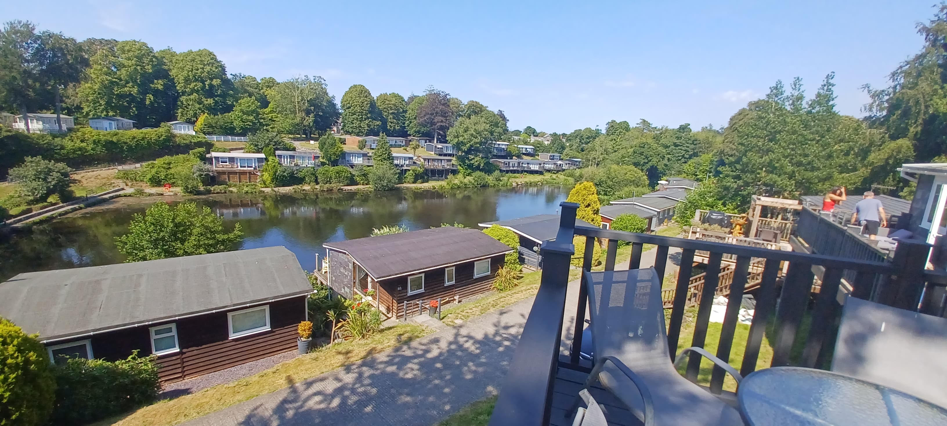 Snowdonia Chalets water and deck view